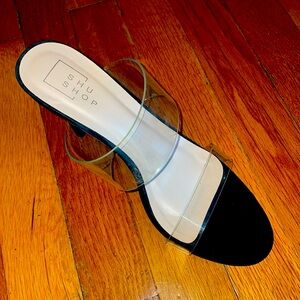 Black heels with clear plastic straps